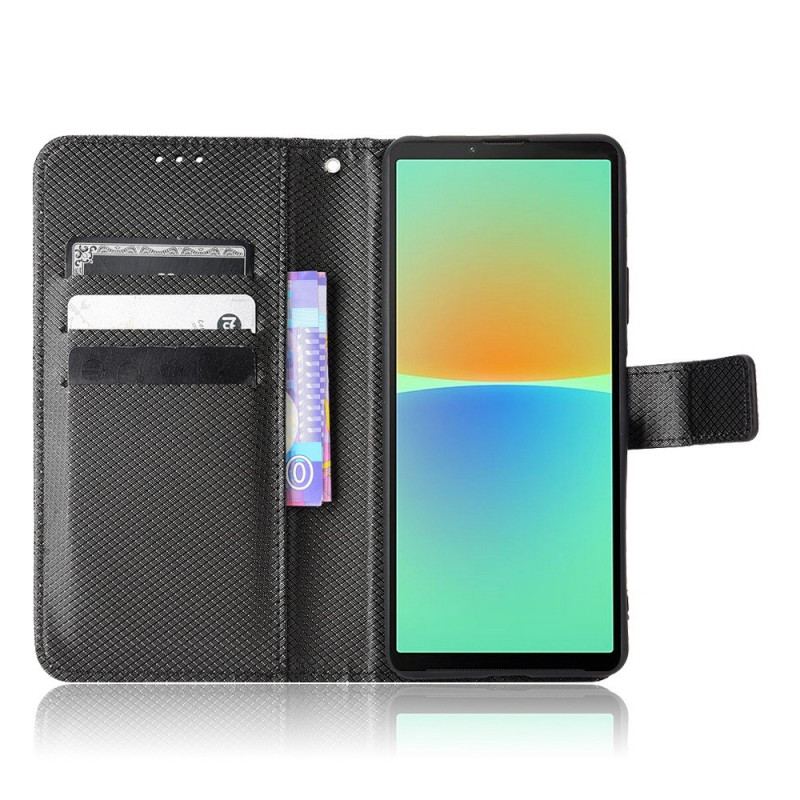 Flip Cover Sony Xperia 10 IV Med Snor Stilfuldt Strappy Imiteret Læder