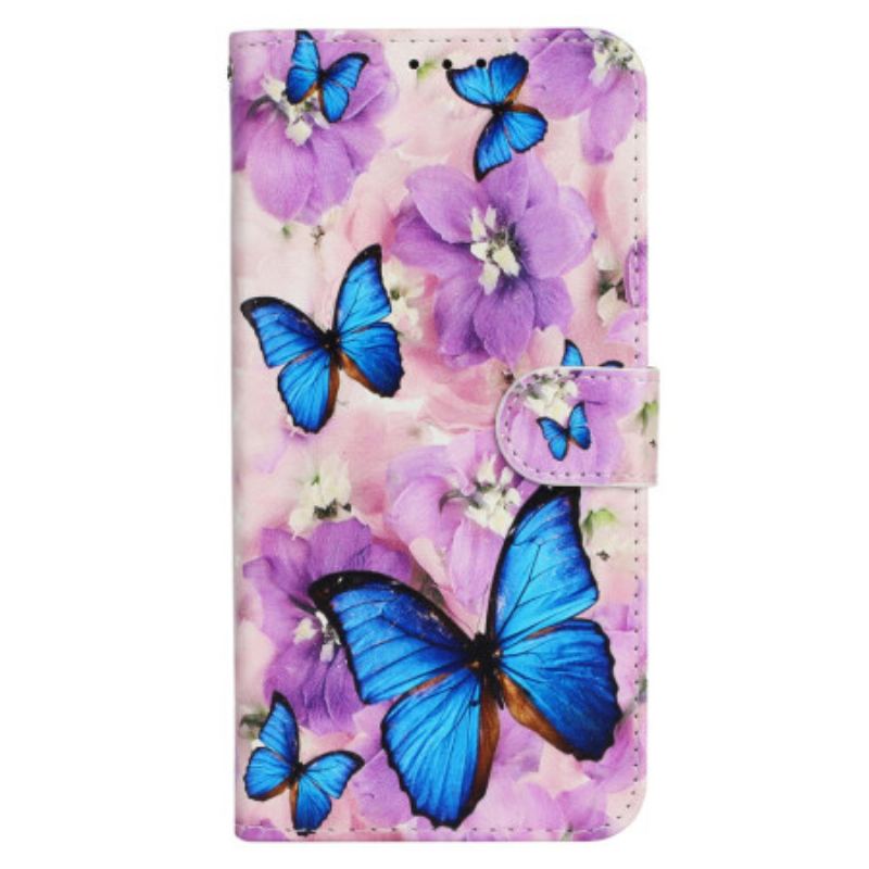 Flip Cover iPhone 16 Blå Sommerfugle Og Lilla Blomster Med Rem