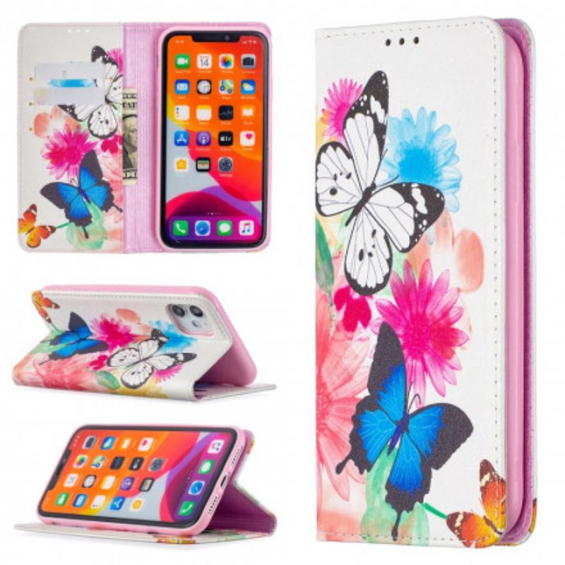 Cover iPhone 11 Flip Cover Farverige Sommerfugle