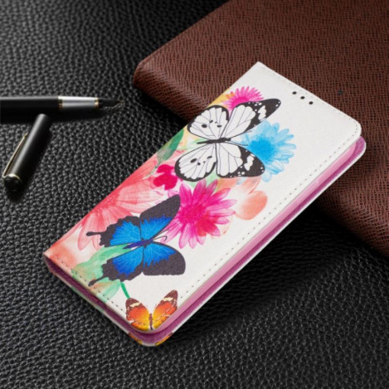 Cover iPhone 11 Flip Cover Farverige Sommerfugle